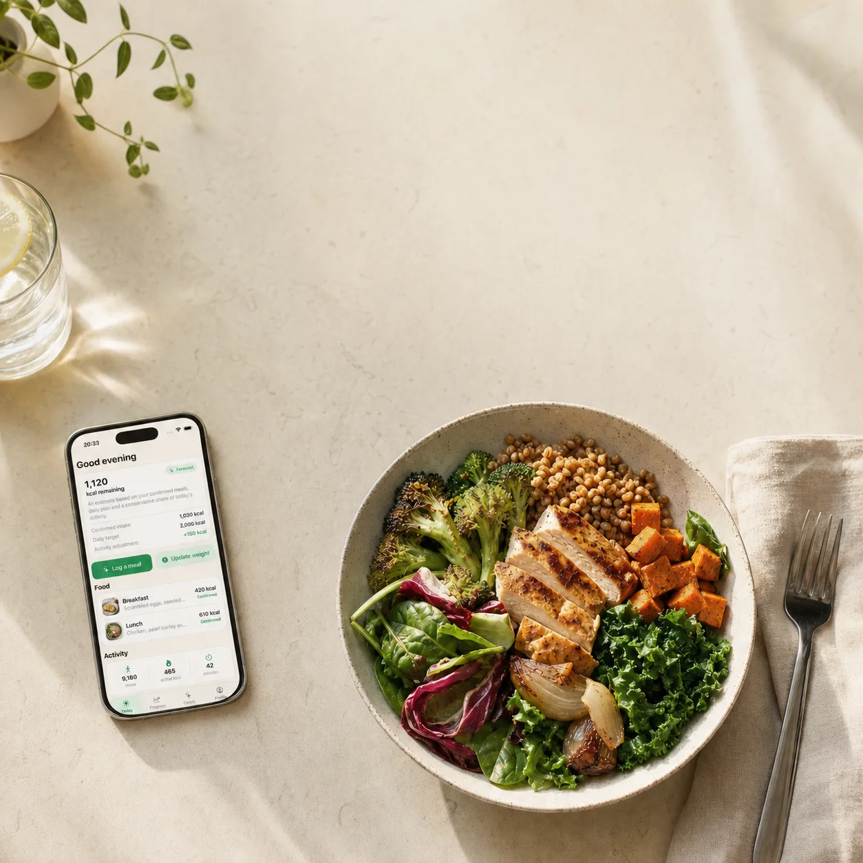 EatLose AI calorie tracker on an iPhone next to a balanced bowl of food